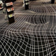 Image for article titled This French Game Store's Carpet is a Total Mind F**k